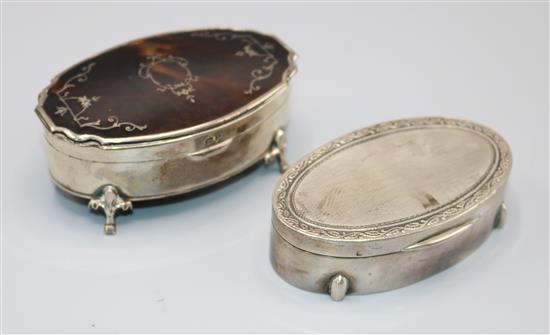 A silver ring box and a similar tortoishell box